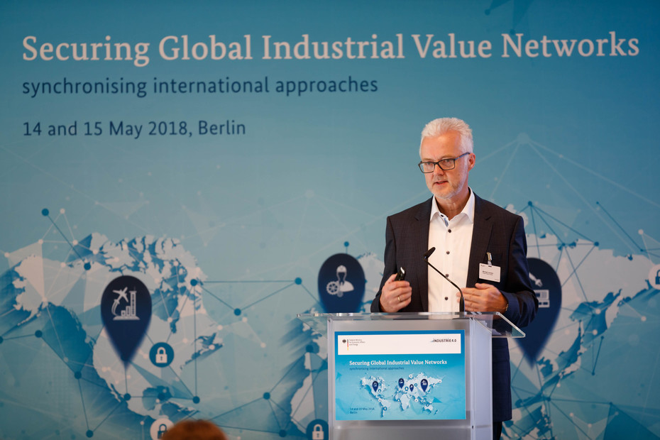 Michael Jochem, Head of the Working Group "Security of Networked Systems" at the conference "Securing Global Industrial Value Networks - Synchronizing International Approaches" in 2018 in Berlin